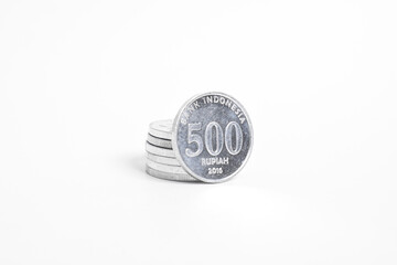 Silver coins stacks isolated on a white background. Indonesian rupiah coin. 500 rupiah coin. metal money