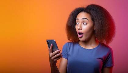 Young girl surprised by the message on her smartphone
