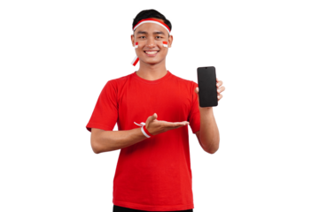 An Indonesian man celebrating Indonesia's independence day on 17 August while holding smartphone with blank screen isolated transparent