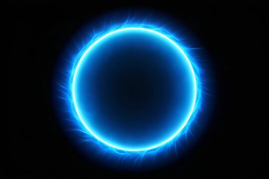 A Stunning Blue Glowing Circle Effect Isolated Against a Black Background Creating a Dramatic Visual Impact , Bright blue circle glowing on a dark background.