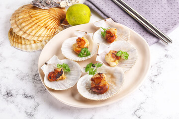 Grilled scallops shell with butter