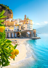 Beautiful view of Amalfi on the Mediterranean coast with lemons in the foreground, Italy
