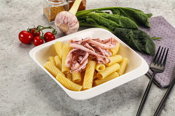 Italian cuisine - pasta tortiglioni with squid