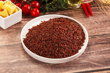 Red raw dry rice gor cooking