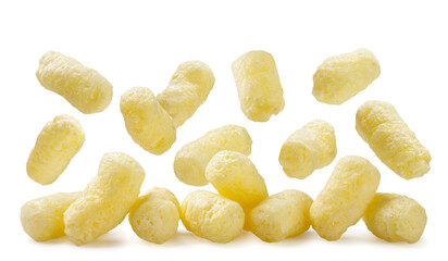 Corn sticks falling close-up on white. Isolated