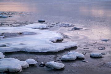 helsinki seaside promenade on a cold icy winter day in helsinki finland with sunset in the...