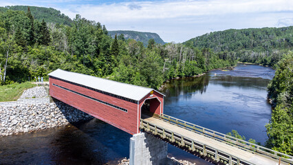 Drone point of view of Louis-Gravel covered bridge (1934). Municipality of Sacré-Coeur, Quebec,...
