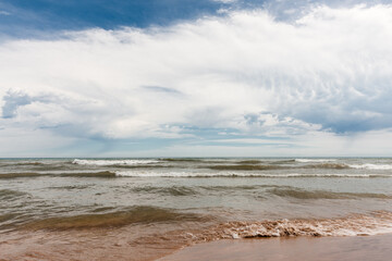 Storm clouds form over the rough waters of  Lake Michigan at Harrington Beach State Park, Belgium, Wisconsin in early September