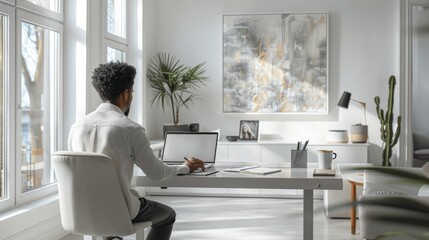 Fototapeta premium Young Man Working on a Laptop in a Bright Modern Home Office Space. Generative AI