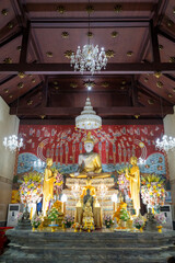 Phra Nakhon Si Ayutthaya District, Wat Yai Chai Mongkhon, Thailand, July 07, 2024, Golden Buddha Shrine in Thai Temple..