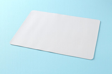 One mouse pad on light blue background