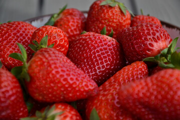 strawberries in a plate on the table