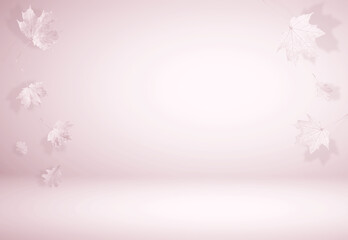 Autumn leaves in air on pastel background, toned in pink color. Space for design