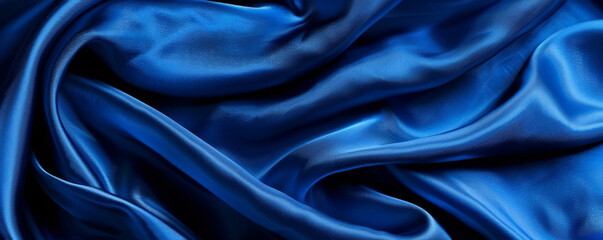 Fototapeta premium A vibrant cobalt background with subtle textures of fabric, like silk or velvet, creating a luxurious and tactile visual effect with highlights and shadows.