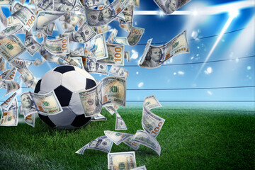 Soccer ball under money rain on stadium