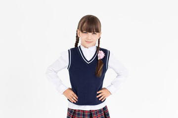 Indoor picture of young good-looking teenage girl isolated on white background in school uniform,...
