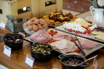 Various food served on a buffet line	