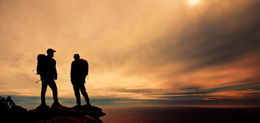 Sunset, mountain peak or people hiking in night outdoor adventure or journey in nature for travel....