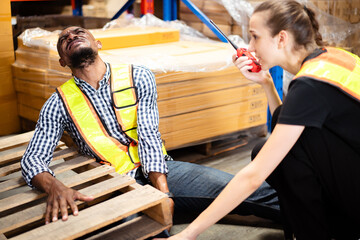 Worker in warehouse have an unexpected accident while working.