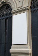 Blank white restaurant or shop sign mockup, large billboard banner on a storefront template.
