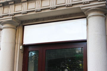 Blank white restaurant or shop sign mockup, large billboard banner on a storefront template.