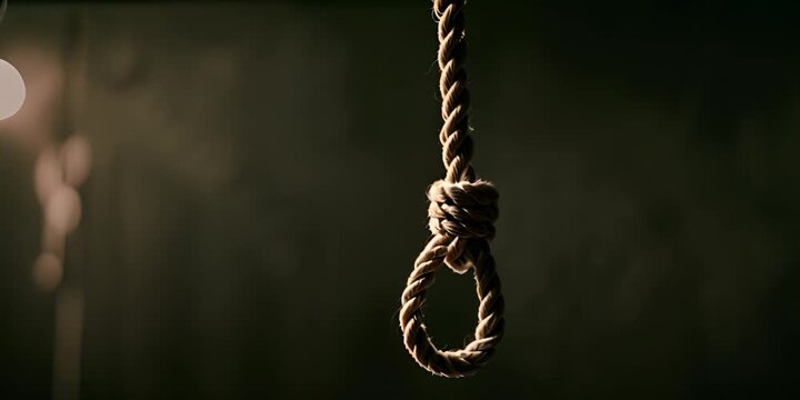 Rope Noose with Hangman Knot Against Dark Background