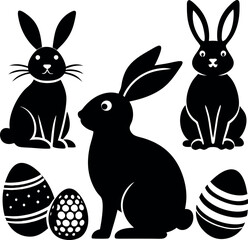 A set of black and white rabbits and eggs