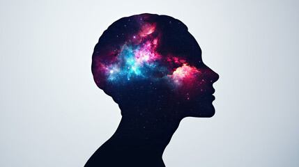 Creative silhouette of a person's head filled with vibrant cosmic colors, symbolizing imagination and the universe of thoughts.