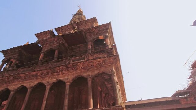 Bhaktapur, Nepal - 6th january, 2024: hyperlapse pov around Krishna Mandir - 17th-century Shikhara-style temple built by King Siddhi Narsing Malla. Patan Durbar Square.UNESCO World Heritage