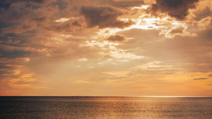 A Landscape of on the sea with red clouds and red sky at sunrise like a oil painting
