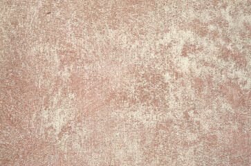 Old white and pink sprayed plaster closeup