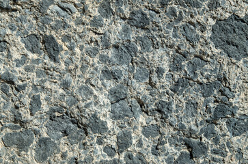Black relief volcanic rock closeup
