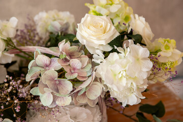 a bouquet of different flowers on the table