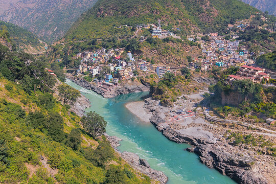Bhagirathi river from left side and Alakananda river with turquoise blue colour from right side converge at Devprayag,Holy conflunece and form river Holy Ganges thereafter.Garhwal, Uttarakhand, India.