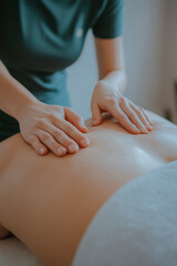 Fototapeta premium A masseur is giving a massage to a woman, photo of the process; promo; advertising, macro
