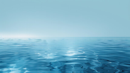 Obraz premium Serene blue water surface reflecting light, creating a calm and tranquil atmosphere ideal for relaxation and meditation.