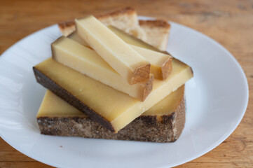 French aged in caves cheese Comte, made from unpasteurised cow milk Prestige,  Vieille Reserve close up
