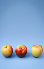 Apples red on monochrome background