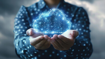 Close-up of a businessman holding a cloud computing icon, symbolizing data transfer loading solutions and secure online storage. Cloud technology concept for application systems.