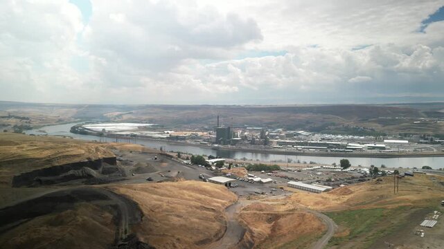 Aerial of industrial plants along Clearwater river in Lewiston Idaho