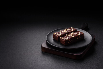 Delicious sweet brownies with chocolate and nuts
