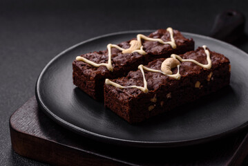 Delicious sweet brownies with chocolate and nuts