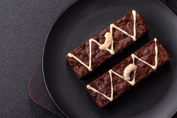 Delicious sweet brownies with chocolate and nuts