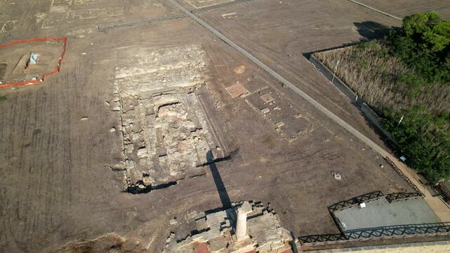 Archaeological area of ​​Capo Colonna. The last column of the Temple of Hera Lacinia remains erected. Italy Crotone 01.08.2024. drone video