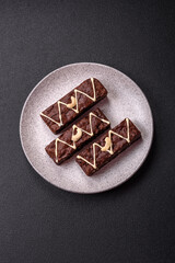 Delicious sweet brownies with chocolate and nuts