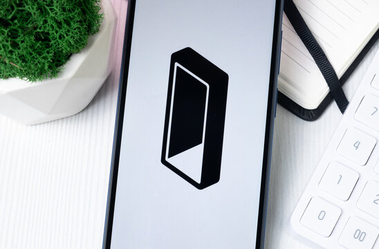 New York, USA - 1 August 2024: Monolith TKN Logo on Phone Screen, Crypto Coin Icon