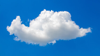 White fluffy curly cloud in the blue sky