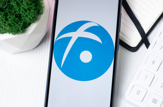 New York, USA - 1 August 2024: Fusion FSN Logo on Phone Screen, Crypto Coin Icon