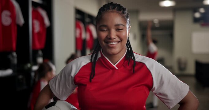 Locker room, soccer ball and face of happy woman for sports, competition or game match with confidence. Portrait, team captain or professional player with pride for football, playing or laugh of girl