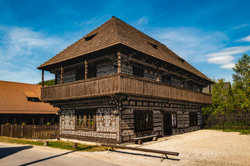 Cicmany, Slovakia - Traditional wooden house with white painted ornaments, UNESCO